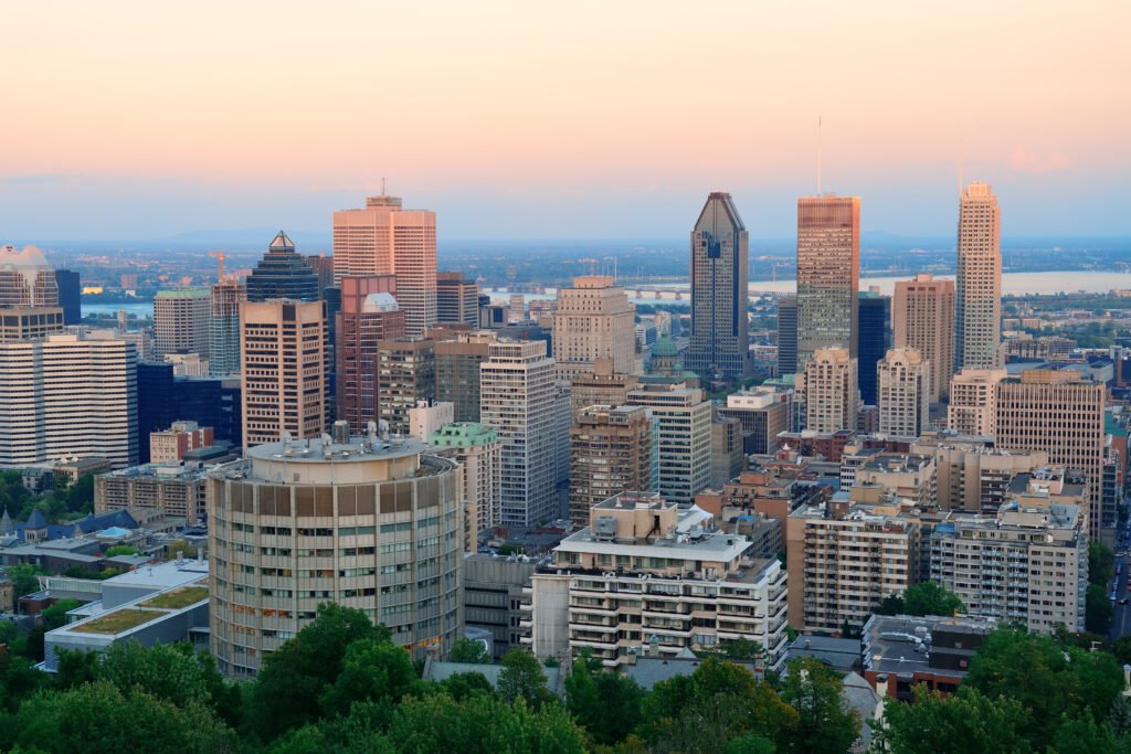montreal city skyline sunset viewed from mont royal with urban skyscrapers
